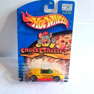 2000 Hot Wheels Chuck E. Cheese's Yellow MX 48 Turbo Toy Car.Unopen